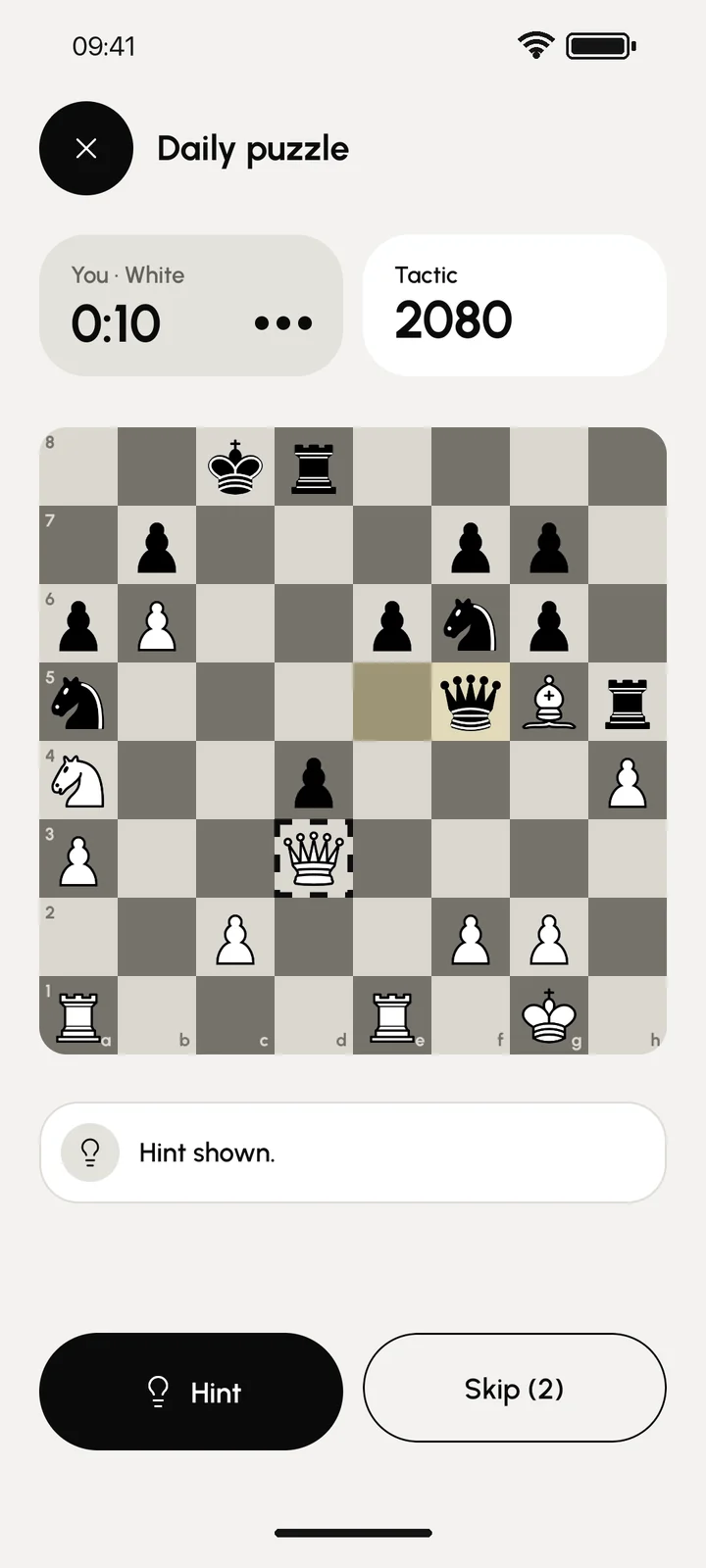 Puzzle screen with a hint on the board.